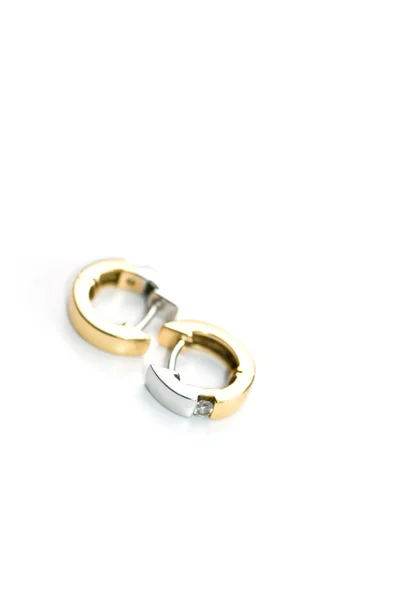 Gold earrings — Stock Photo, Image