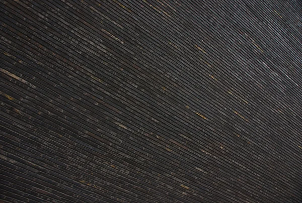 Muro di mattoni neri — Foto Stock