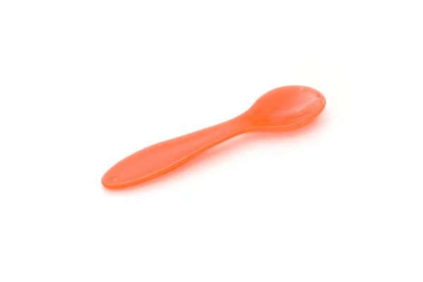 Cucchiaio di plastica rosso — Foto Stock