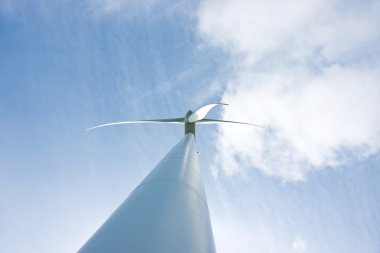 Photo of Wind power installation in sunny day clipart