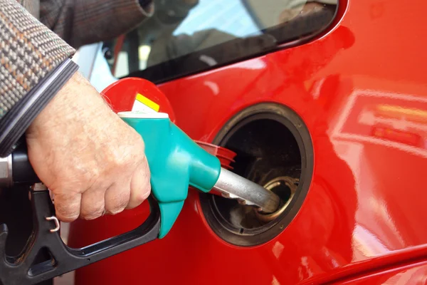 stock image Putting gasoline