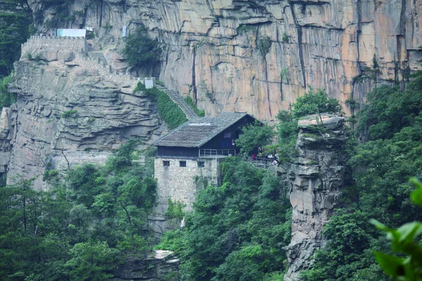 stock image Cottage in the mountain wall