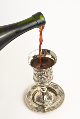 Shabbats wine in the cup clipart