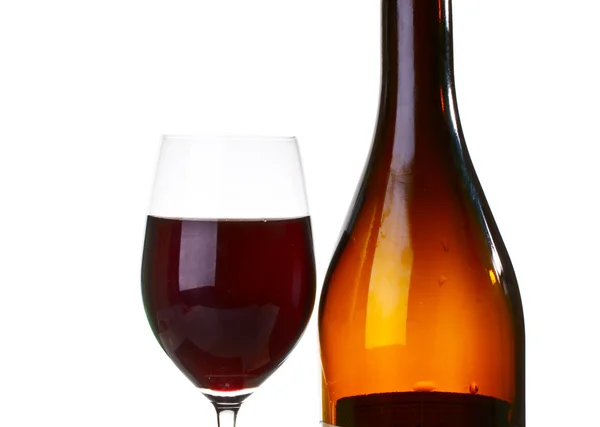 Jet of red wine current in a glass — Stock Photo, Image