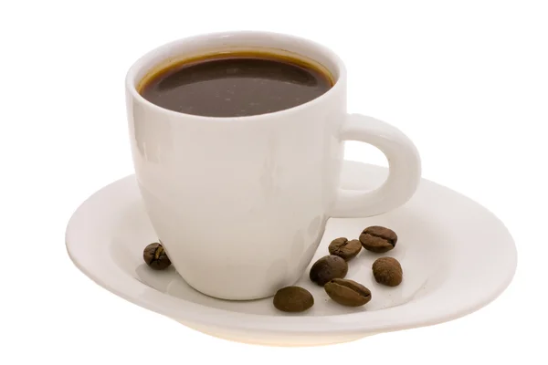 Кубок с кофе и зерном — стоковое фото