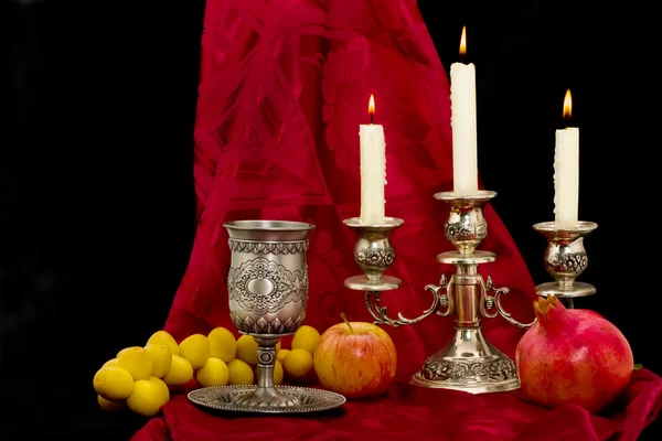 Pohár ovoce a svíčky — Stock fotografie