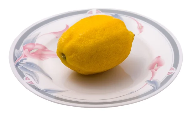 Lemon on the plate — Stock Photo, Image