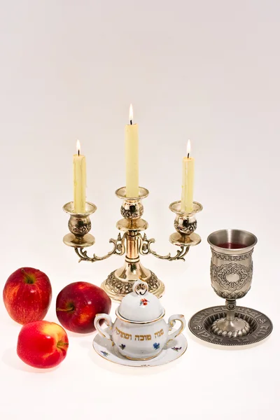 Cup apple and candlestick — Stock Photo, Image