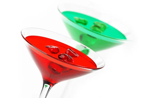 Martiniglas med röda och gröna coctails isolerad på vit — Stockfoto