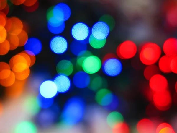 Lumières multicolores floues abstraites colorées de Noël — Photo