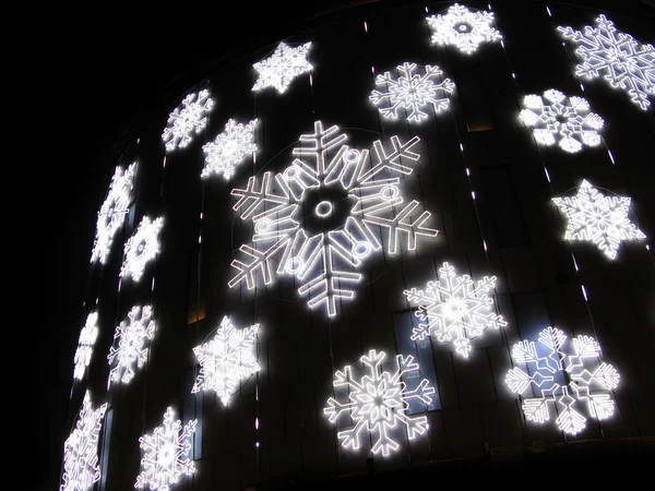 Christmas lights simulating frozen snowflakes. Barcelona street detail — Stock Photo, Image