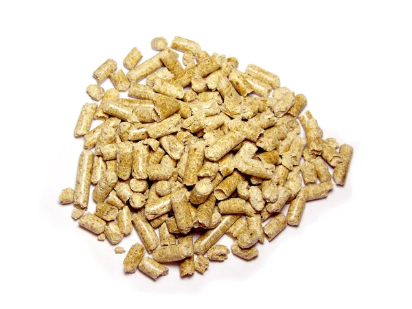 Wood pellets background close up. Isolated in white — Stock Photo, Image