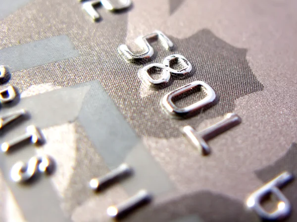 stock image Numbers of golden credit card in very close up