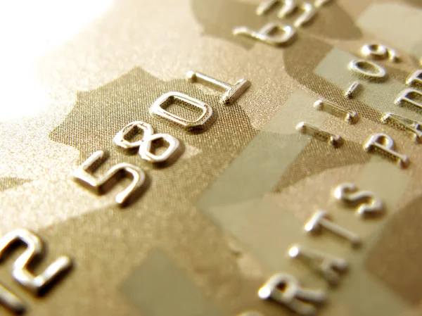 stock image Numbers of golden credit card in very close up