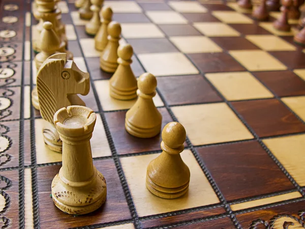 Stock image Wooden white and brown chessboard close-up