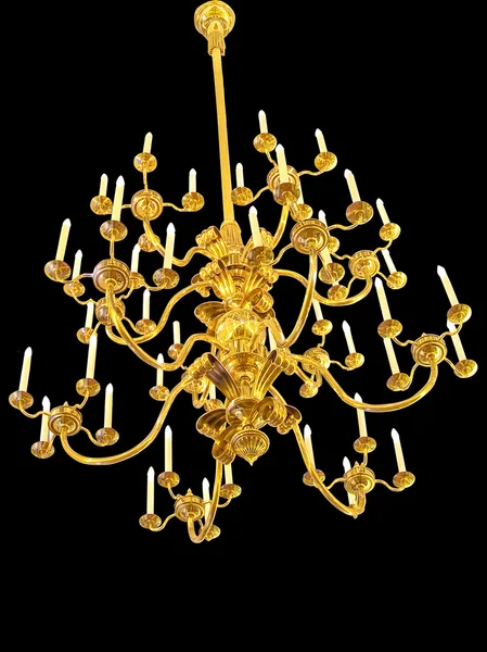 Golden antique chandelier isolated in black — Stock Photo, Image