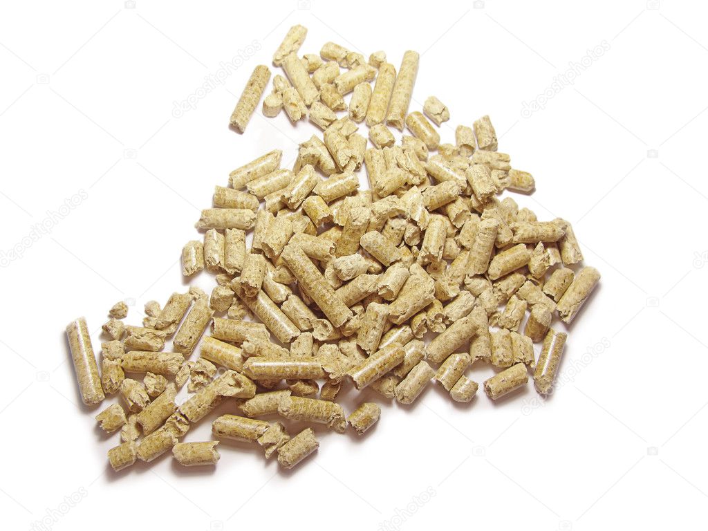 Wood pellets background close up. Isolated in white