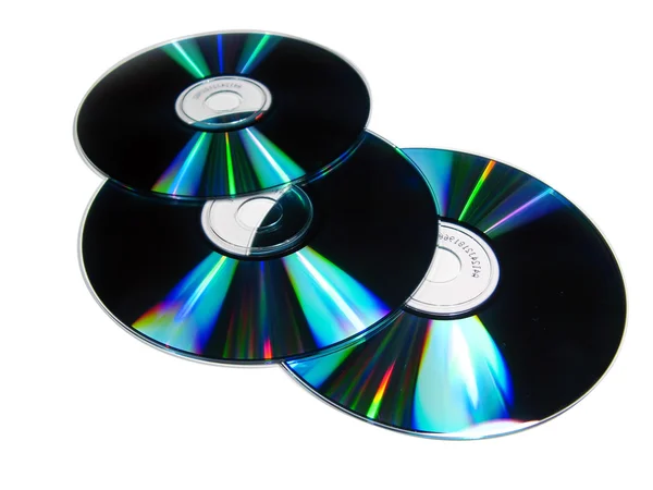 Три компактных диска, выделенных белым — стоковое фото