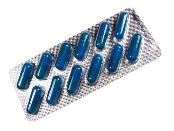Krabička pilulek, izolovaných v bílém — Stock fotografie