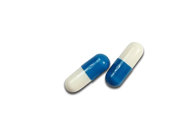 Comprimidos isolados em fundo branco — Fotografia de Stock