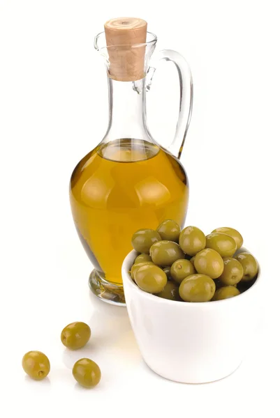 Декантер з оливковою олією — стокове фото