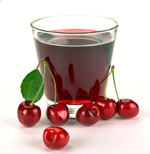 Suco de cereja em um copo — Fotografia de Stock