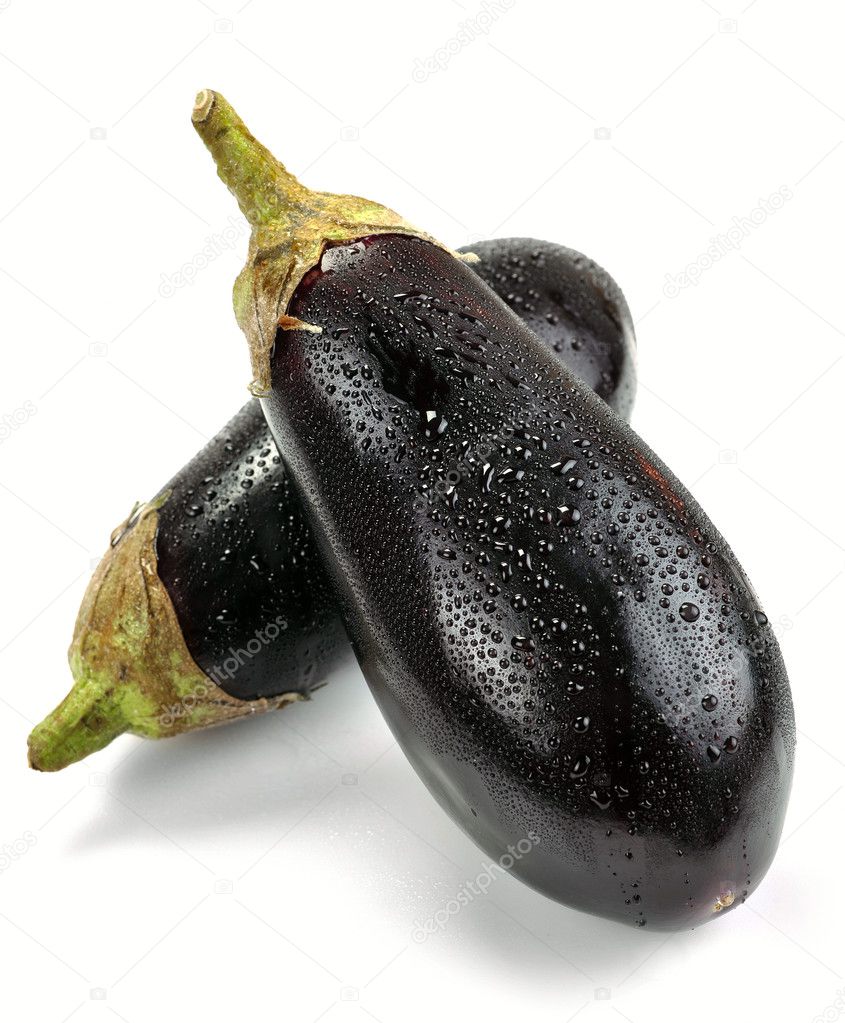 Aubergines with drops of water