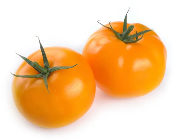 Два жёлтых томата — стоковое фото