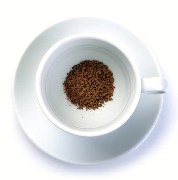 颗粒的速溶咖啡在杯中 — 图库照片