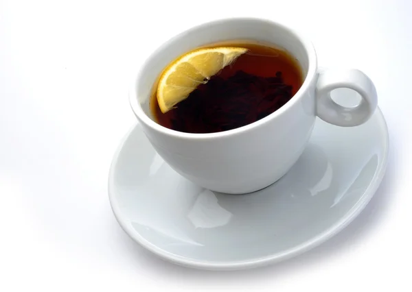Tazza di tè con un limone — Foto Stock