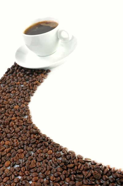 Taza de café y granos de café — Foto de Stock