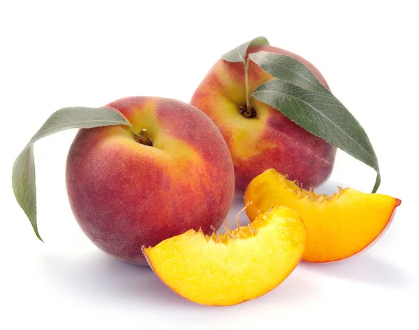 Peach and leaves — Stock Photo, Image