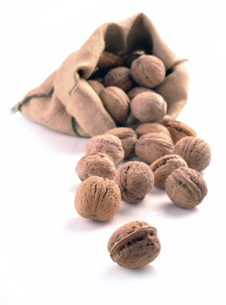 Walnuts in the tissue sac — Stock Photo, Image