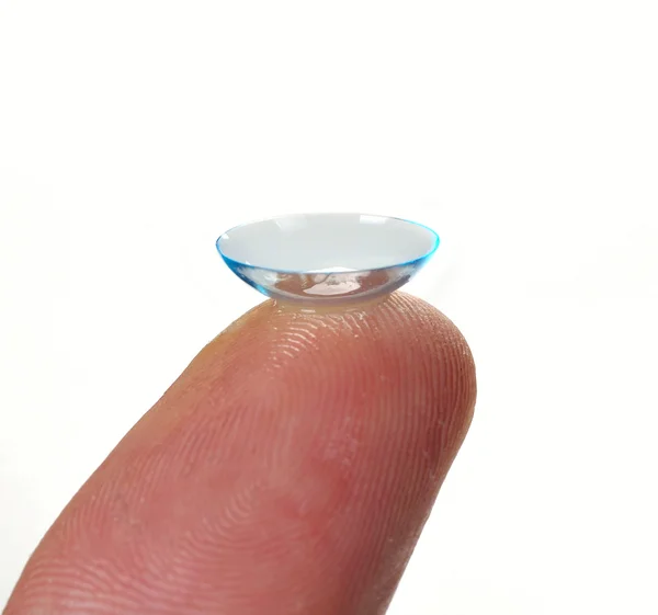 Finger with a contact lens — Stock Photo, Image