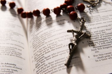 Red rosary and holy bible clipart