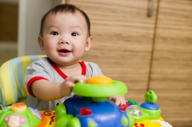 6 month old Asian baby girl smiling clipart