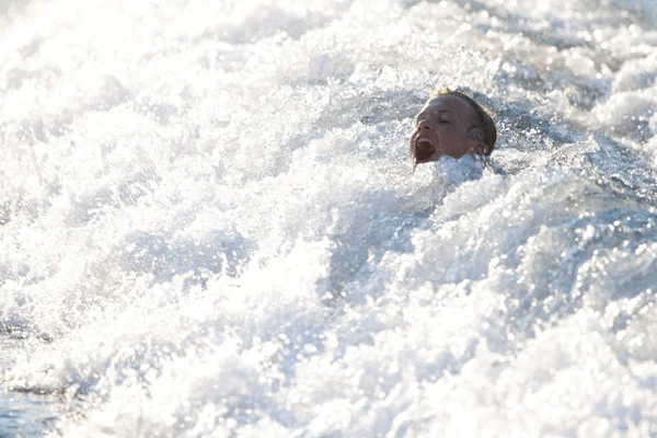 stock image Head of screaming boy above the water