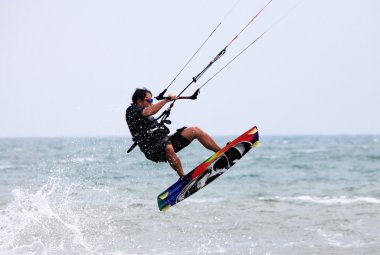 Kitesurfer in action clipart
