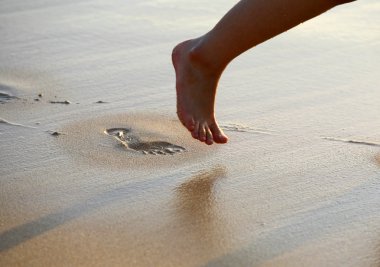 Foot Prints on Beach clipart