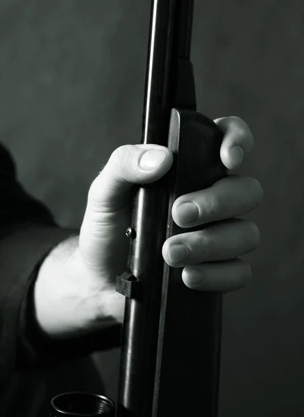 Gun in a hand — Stock Photo, Image