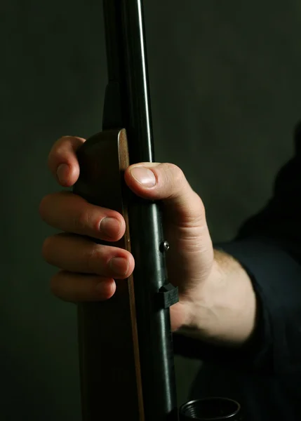 Arma em uma mão — Fotografia de Stock