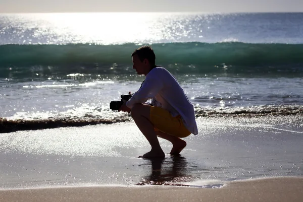 Fotografo su una spiaggia — Foto Stock