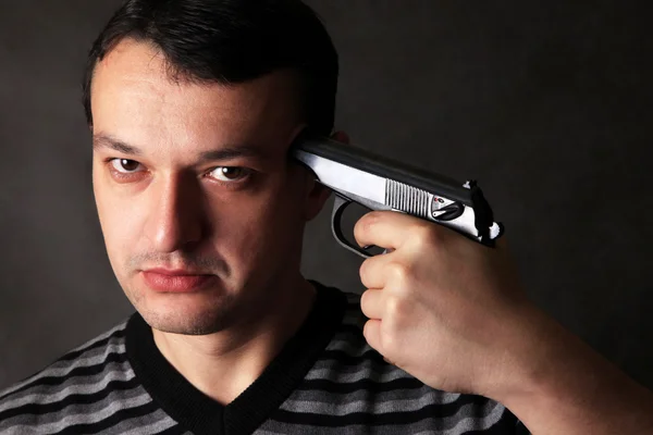Man with a pistol — Stock Photo, Image