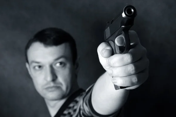 Człowiek z pistoletu — Zdjęcie stockowe