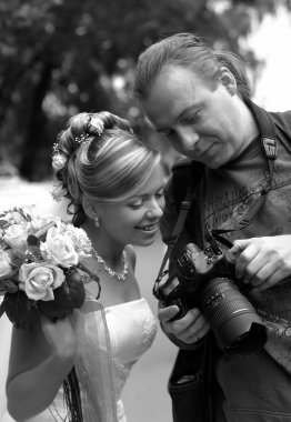 Bride and photographer clipart