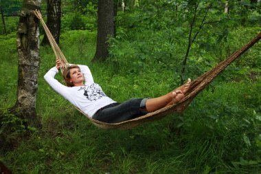 Woman in a hammock clipart
