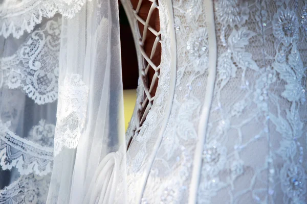 Wedding dress and veil — Stock Photo, Image