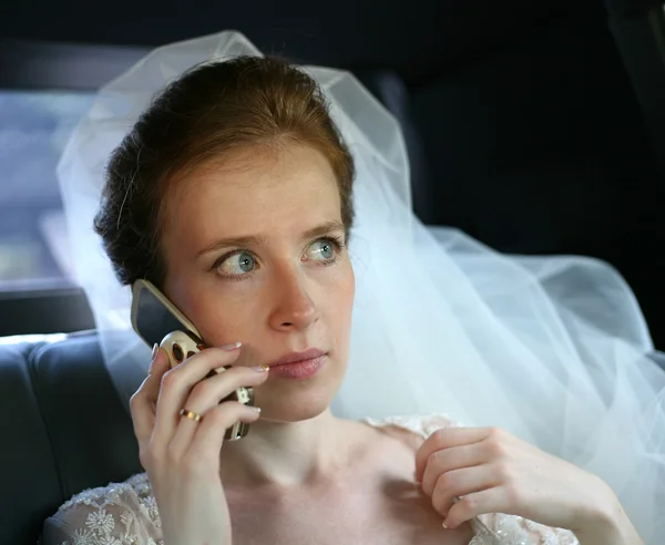 Bride with the phone — Stock Photo, Image