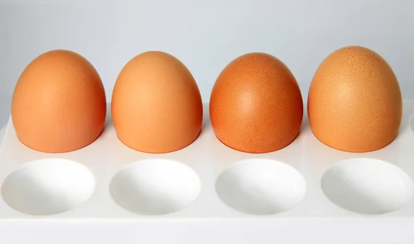 Vier isolierte Eier — Stockfoto