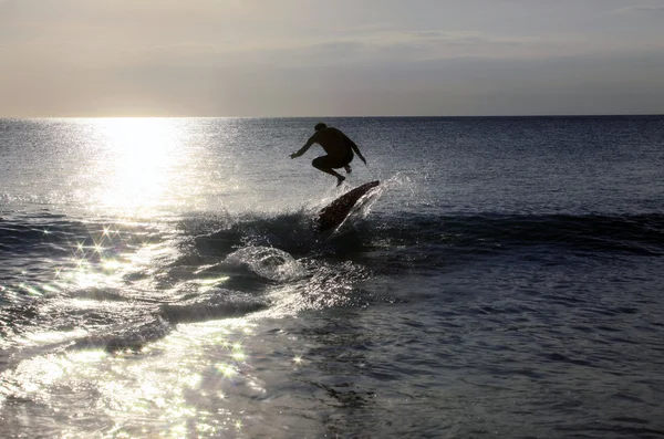 Surfer on sunset — Stock Photo, Image